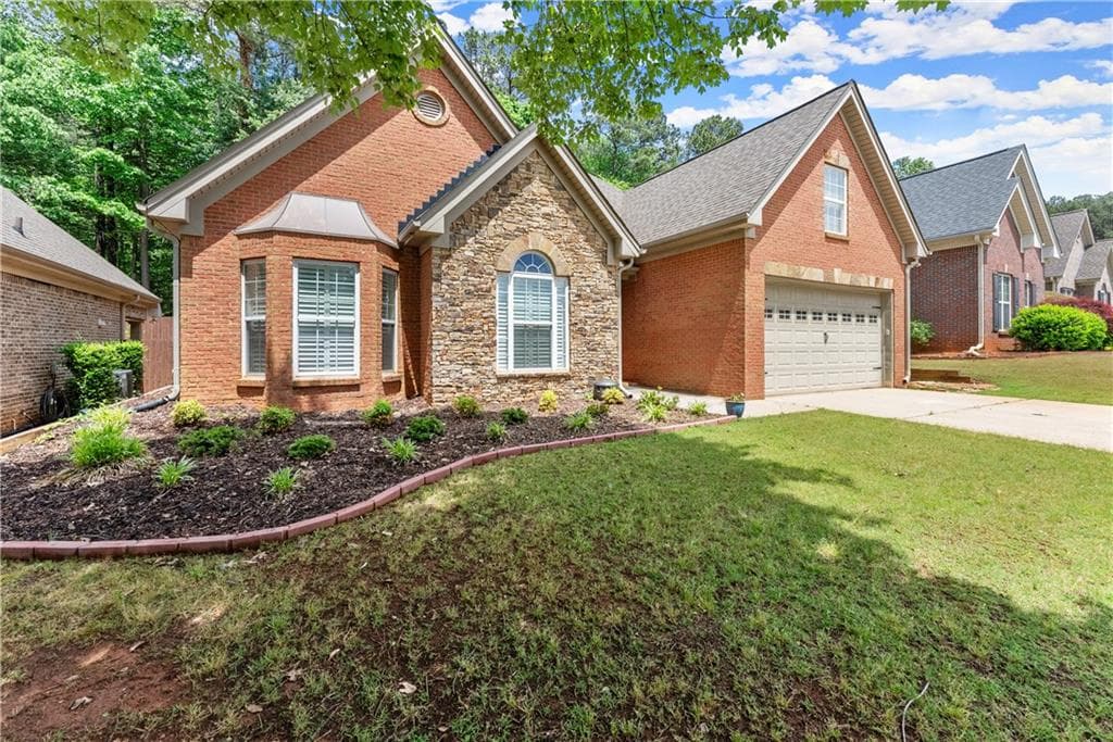 4 bedroom, 2 bathroom, 2,369 sq ft single family residence for sale at 2110 Retreat Haven Lane, Dacula, GA 30019 — photo 3