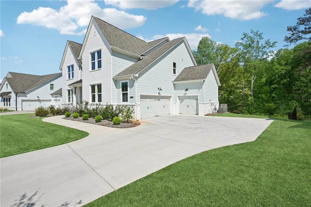 7 bedroom, 5 bathroom, 4,030 sq ft single family residence for sale at 7945 Heritage Farm Court, Dawsonville, GA 30534 — photo 5