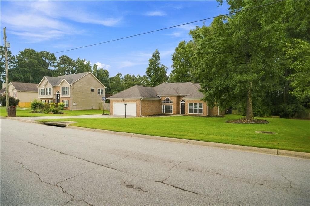 3 bedroom, 2 bathroom, 1,791 sq ft single family residence for sale at 3505 Garden Walk Ln, Loganville, GA 30052 — photo 2