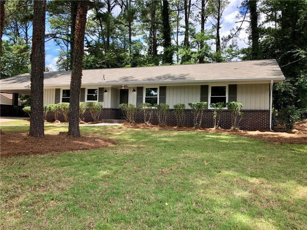 3 bedroom, 2 bathroom, 1,693 sq ft single family residence for rent at 4142 Blackhawk Drive, Stone Mountain, GA 30083 for $2,500 a month — photo 1 of 17