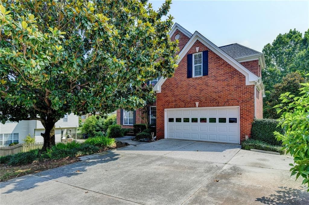 6 bedroom, 5 bathroom single family residence for rent at 2899 Savannah Walk Lane, Suwanee, GA 30024 for $3,200 a month — photo 1 of 27