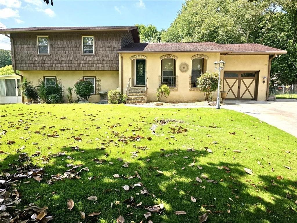 4 bedroom, 3 bathroom, 2,340 sq ft single family residence for sale at 1244 Hickory Wood Drive, Woodstock, GA 30188 — photo 2
