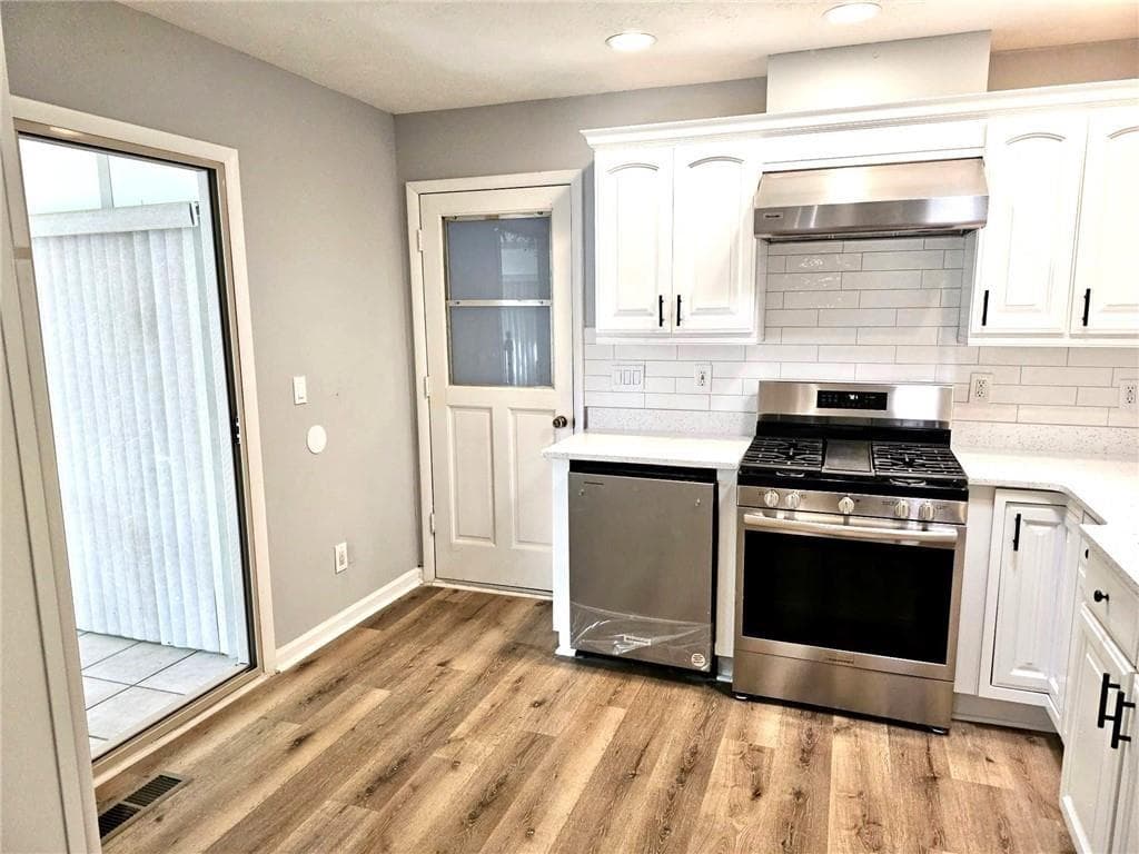 4 bedroom, 3 bathroom, 2,340 sq ft single family residence for sale at 1244 Hickory Wood Drive, Woodstock, GA 30188 — photo 9