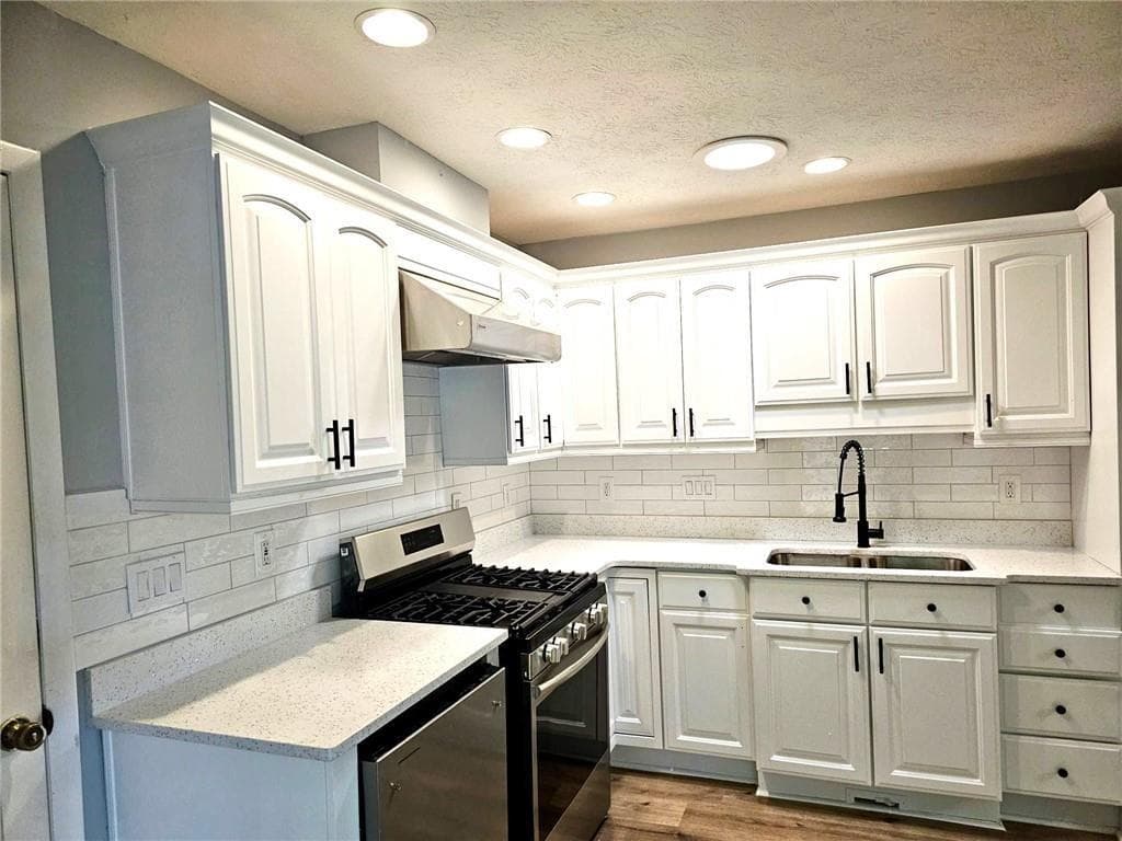 4 bedroom, 3 bathroom, 2,340 sq ft single family residence for sale at 1244 Hickory Wood Drive, Woodstock, GA 30188 — photo 10