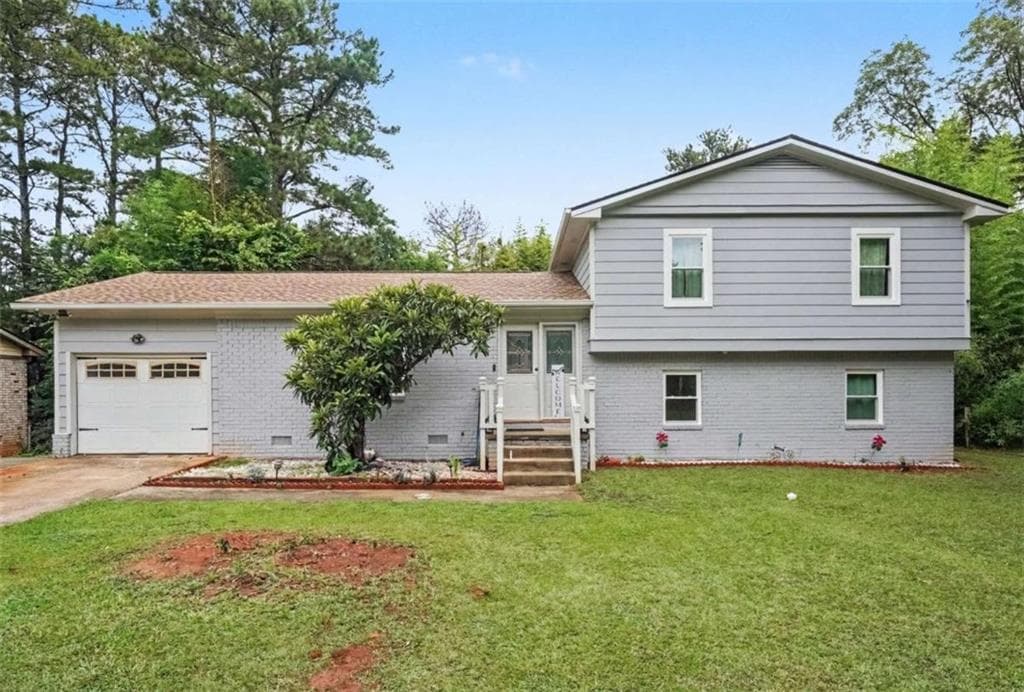 4 bedroom, 3 bathroom, 1,873 sq ft single family residence for sale at 4276 Indian Forest Road, Stone Mountain, GA 30083 — photo 2