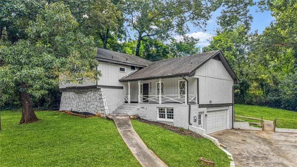 4 bedroom, 3 bathroom, 2,635 sq ft single family residence for sale at 4447 Lake Breeze Drive, Stone Mountain, GA 30083
