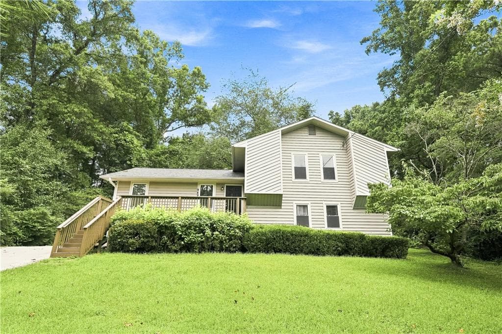 4 bedroom, 2 bathroom, 1,989 sq ft single family residence for sale at 949 Falconcrest Drive, Lawrenceville, GA 30043 — photo 1 of 23