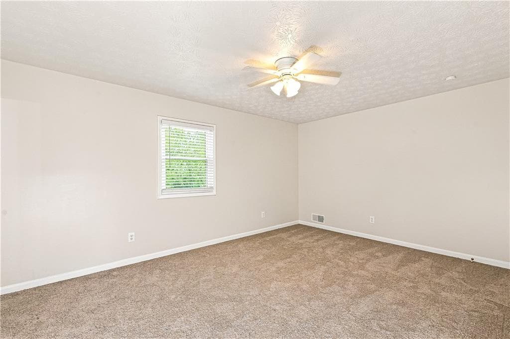 4 bedroom, 2 bathroom, 1,989 sq ft single family residence for sale at 949 Falconcrest Drive, Lawrenceville, GA 30043 — photo 9