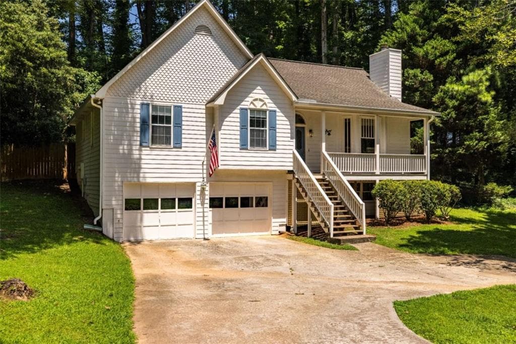 3 bedroom, 2 bathroom, 2,755 sq ft single family residence for sale at 606 Rose Creek Cove, Woodstock, GA 30189 — photo 2