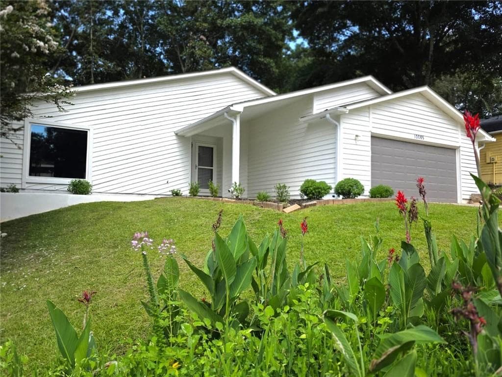 3 bedroom, 2 bathroom, 1,874 sq ft single family residence for sale at 10085 Old Woodland Entry, Johns Creek, GA 30022 — photo 2