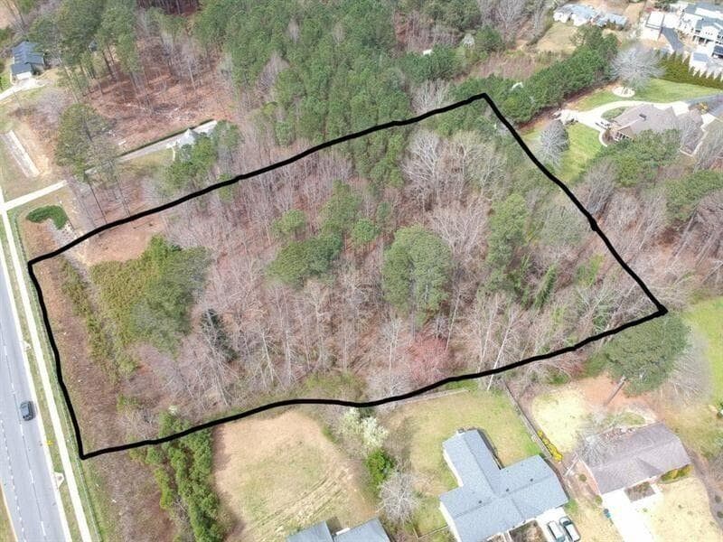 unimproved land for sale at 5431 Cumming Highway, Sugar Hill, GA 30518 — photo 1 of 21