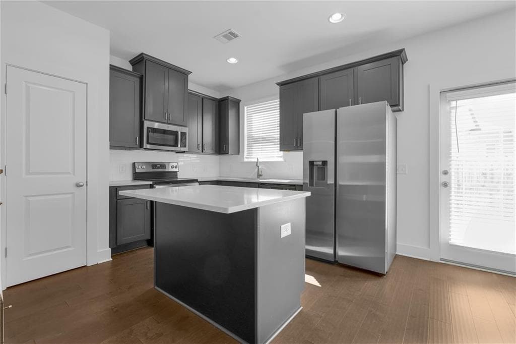 3 bedroom, 3 bathroom, 1,486 sq ft townhouse for rent at 6433 Scudders Drive, Lithonia, GA 30058 for $2,050 a month — photo 1 of 30