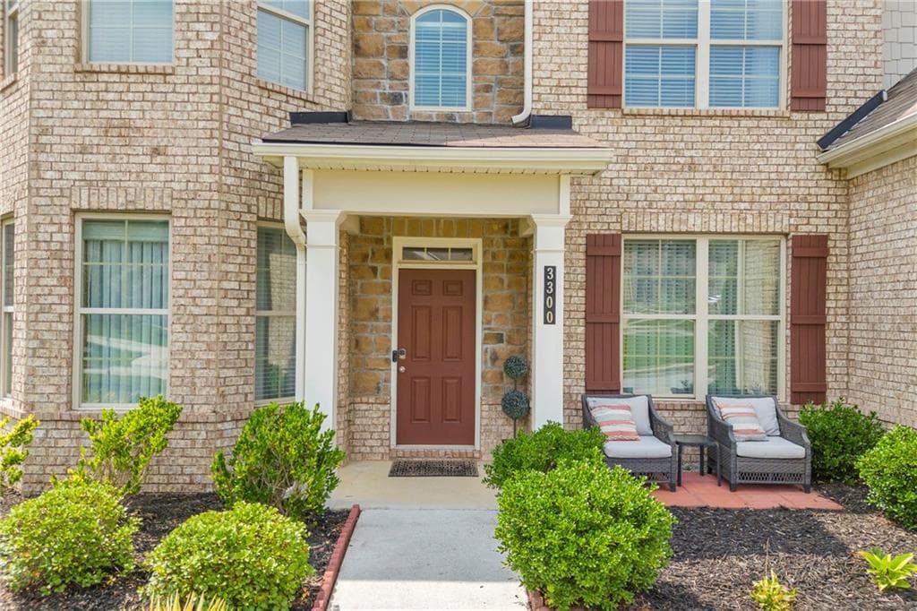 5 bedroom, 4 bathroom, 3,504 sq ft single family residence for sale at 3300 Deaton Trail, Buford, GA 30519 — photo 3