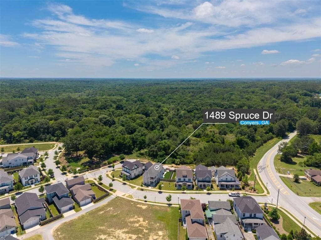 5 bedroom, 4 bathroom, 2,833 sq ft single family residence for sale at 1489 Spruce Drive, Conyers, GA 30094 — photo 2