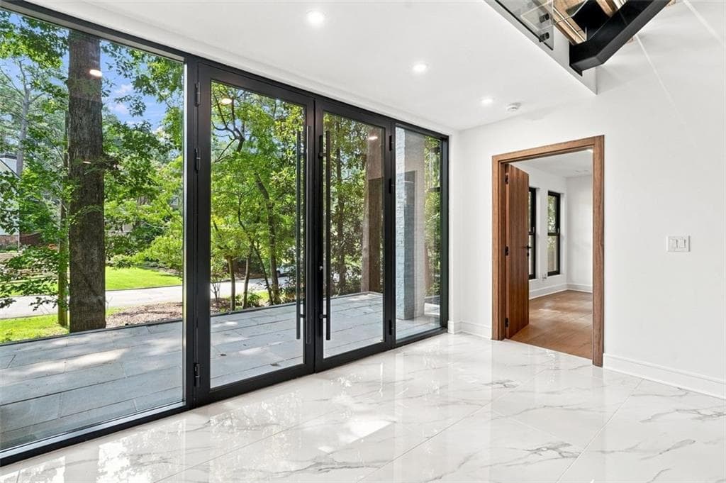 5 bedroom, 7 bathroom, 4,516 sq ft single family residence for sale at 4250 Carmain Drive, Atlanta, GA 30342 — photo 2