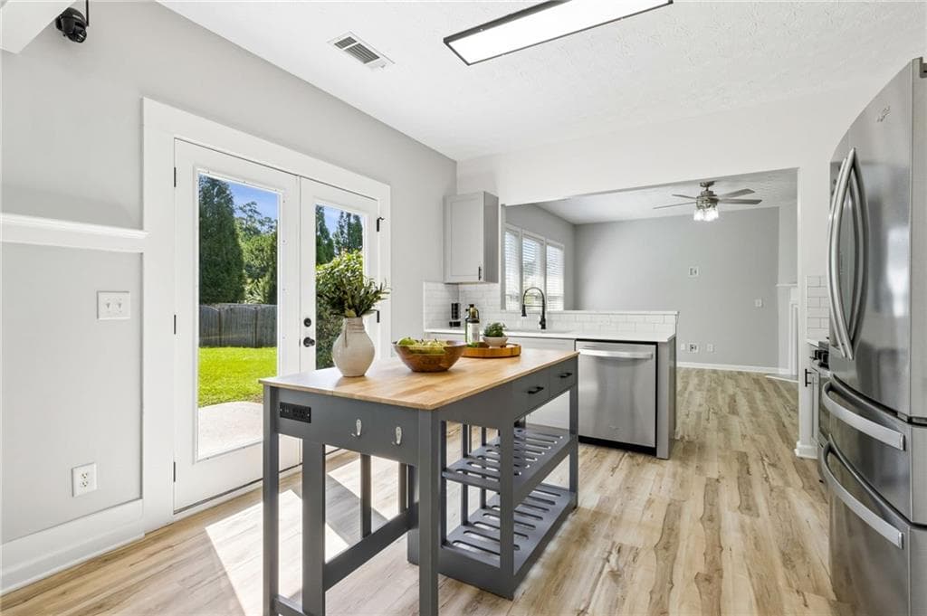 4 bedroom, 3 bathroom, 1,928 sq ft single family residence for sale at 313 Woodland Pass, Canton, GA 30114 — photo 5