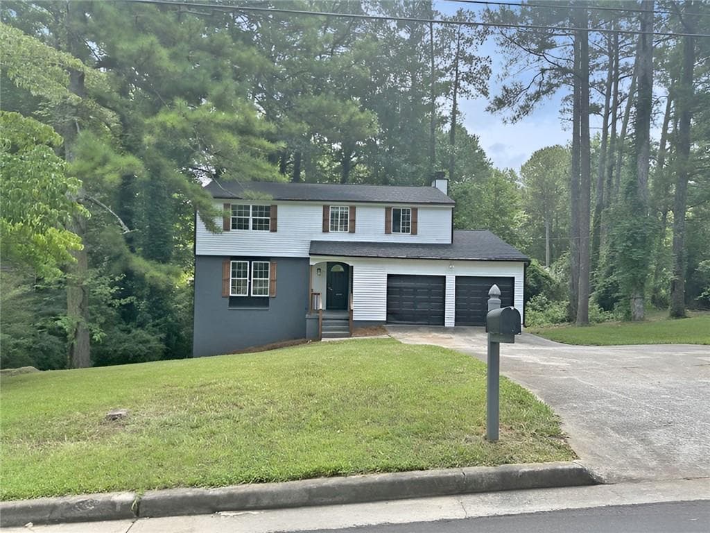 3 bedroom, 3 bathroom, 1,799 sq ft single family residence for sale at 1906 Madras Court, Lithonia, GA 30058 — photo 2