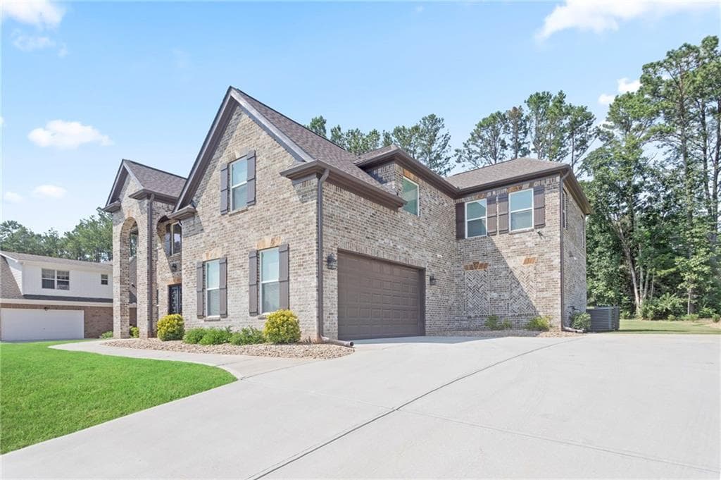 5 bedroom, 4 bathroom, 4,552 sq ft single family residence for sale at 2556 Westchester Way, Conyers, GA 30013 — photo 2