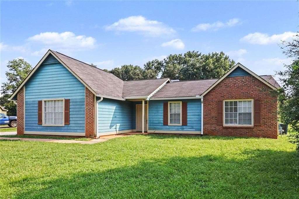 3 bedroom, 2 bathroom, 1,274 sq ft single family residence for sale at 9587 Thomas Downs Lane, Jonesboro, GA 30238 — photo 2