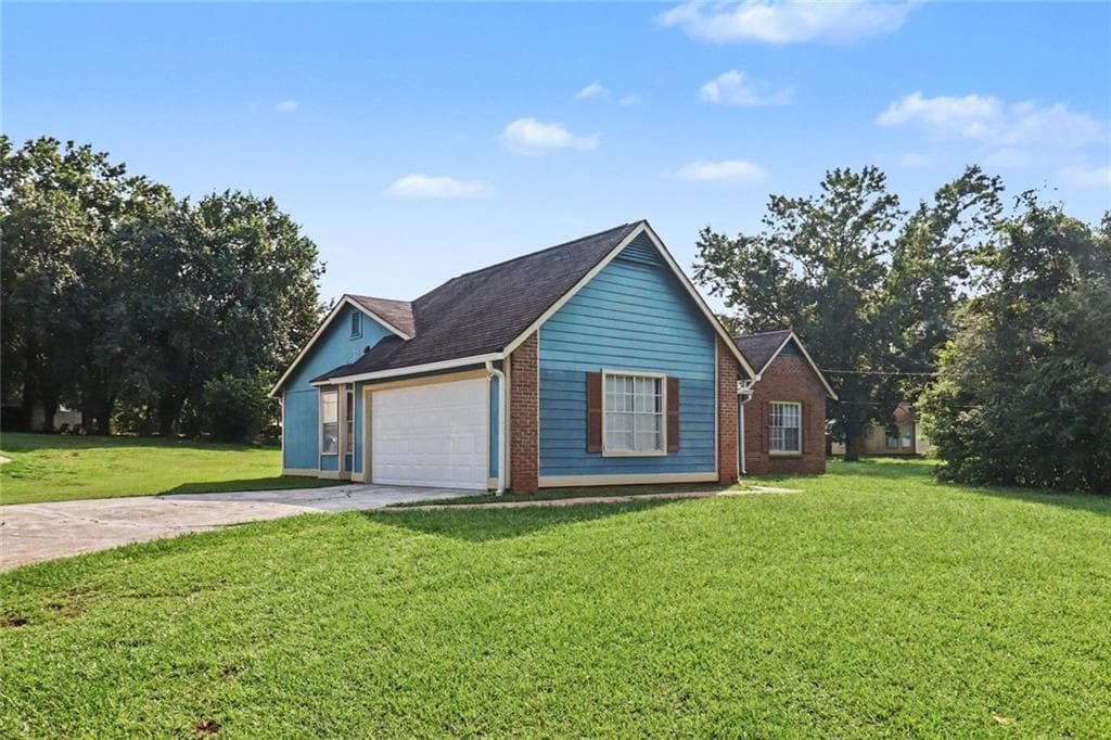 3 bedroom, 2 bathroom, 1,274 sq ft single family residence for sale at 9587 Thomas Downs Lane, Jonesboro, GA 30238 — photo 3