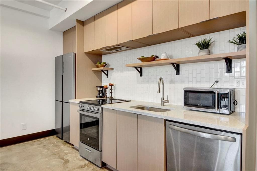 1 bedroom, 1 bathroom, 587 sq ft condominium for sale at 1805 Harvard Avenue 305, College Park, GA 30337 — photo 9