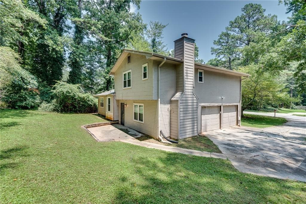 3 bedroom, 2 bathroom single family residence for rent at 597 Field Cliff Drive, Stone Mountain, GA 30087 for $2,400 a month — photo 2