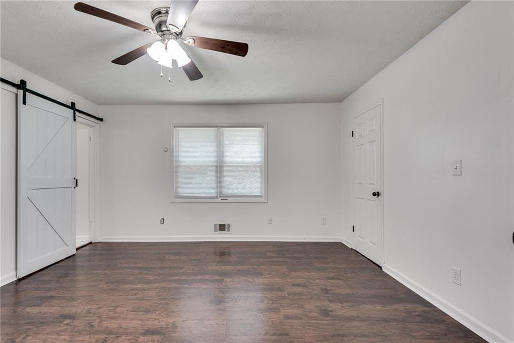 3 bedroom, 2 bathroom single family residence for rent at 597 Field Cliff Drive, Stone Mountain, GA 30087 for $2,400 a month — photo 3