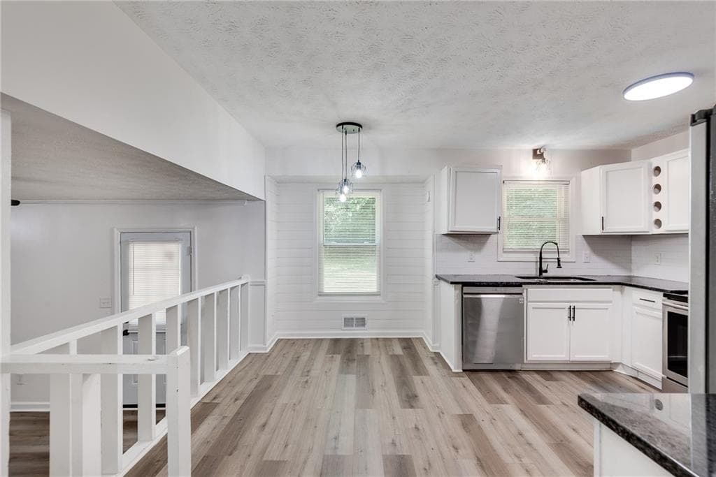 3 bedroom, 2 bathroom single family residence for rent at 597 Field Cliff Drive, Stone Mountain, GA 30087 for $2,400 a month — photo 7