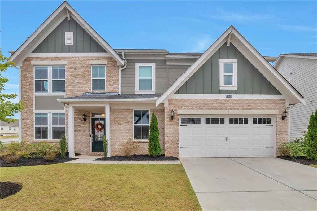 5 bedroom, 3 bathroom, 2,915 sq ft single family residence for sale at 1106 Michigan Circle, Hoschton, GA 30548 — photo 1 of 25