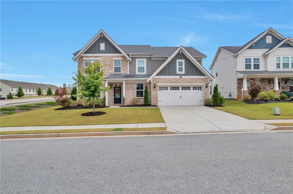 5 bedroom, 3 bathroom, 2,915 sq ft single family residence for sale at 1106 Michigan Circle, Hoschton, GA 30548 — photo 2