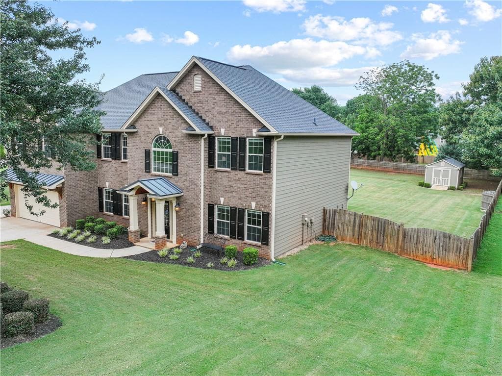 4 bedroom, 3 bathroom, 3,550 sq ft single family residence for sale at 5727 Pleasant Woods Drive, Flowery Branch, GA 30542 — photo 7