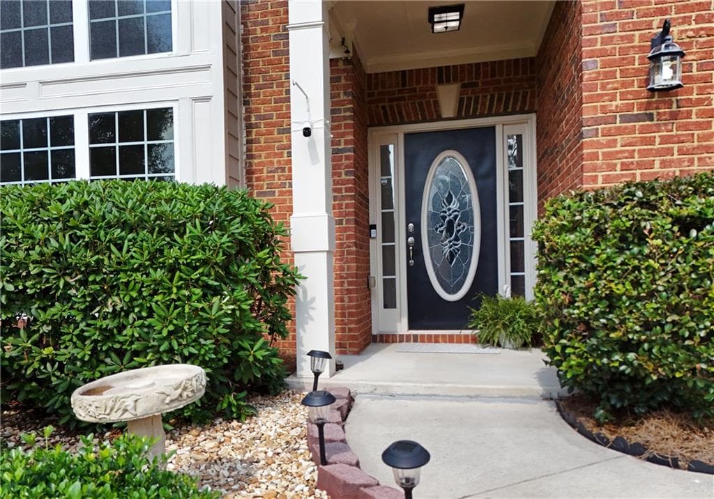 6 bedroom, 4 bathroom, 3,333 sq ft single family residence for sale at 6015 Thrasher Court, Cumming, GA 30028 — photo 5