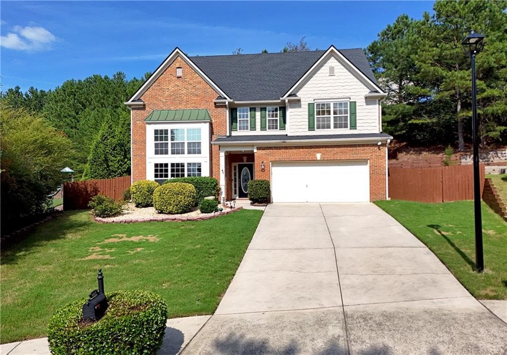 6 bedroom, 4 bathroom, 3,333 sq ft single family residence for sale at 6015 Thrasher Court, Cumming, GA 30028 — photo 7