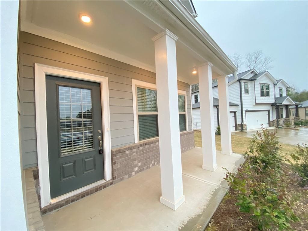 4 bedroom, 3 bathroom, 2,644 sq ft single family residence for sale at 3290 Summerpoint Crossing, Cumming, GA 30028 — photo 6