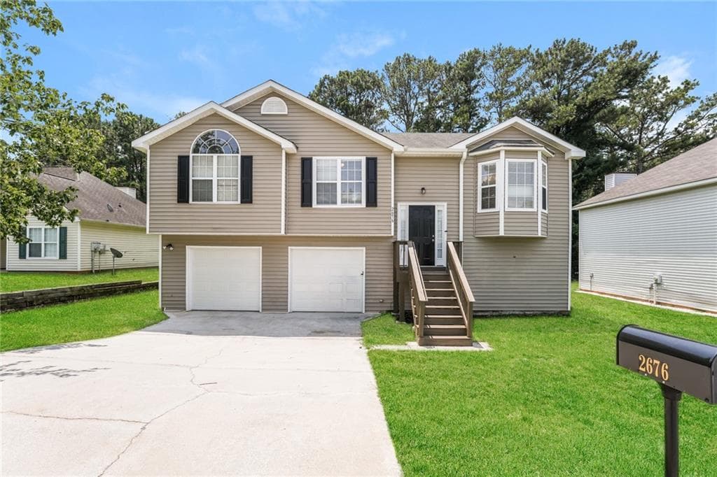4 bedroom, 3 bathroom, 1,792 sq ft single family residence for sale at 2676 Field Spring Drive, Lithonia, GA 30058 — photo 1 of 27