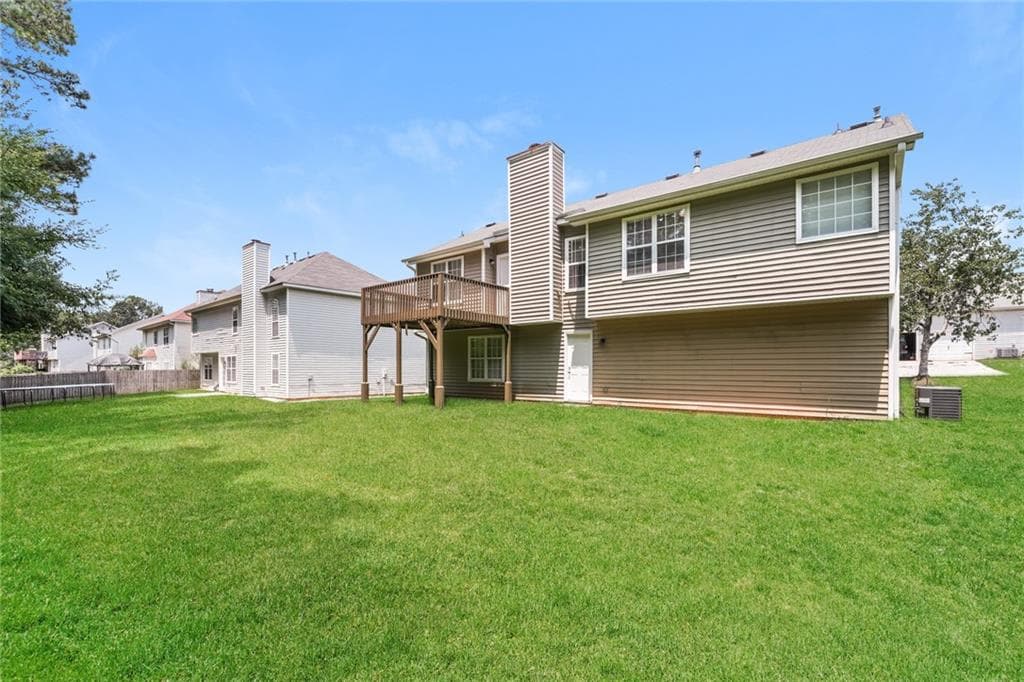 4 bedroom, 3 bathroom, 1,792 sq ft single family residence for sale at 2676 Field Spring Drive, Lithonia, GA 30058 — photo 3
