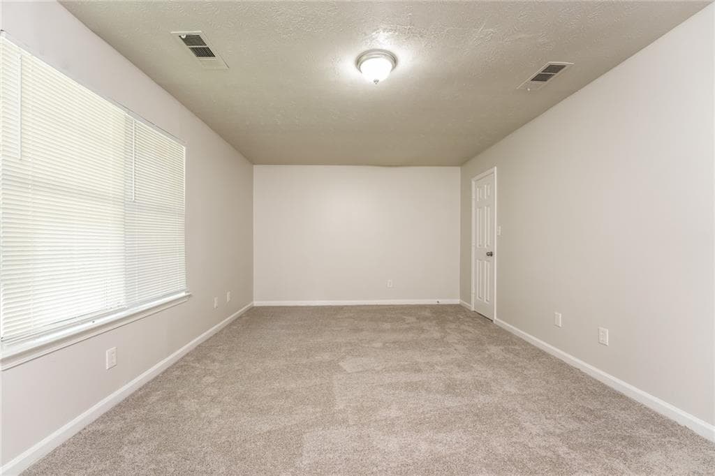 4 bedroom, 3 bathroom, 1,792 sq ft single family residence for sale at 2676 Field Spring Drive, Lithonia, GA 30058 — photo 10