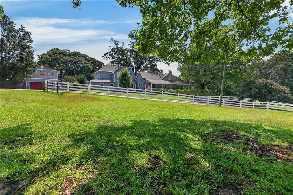 6 bedroom, 4 bathroom, 4,383 sq ft single family residence for sale at 1111 Bakers Bridge Road, Douglasville, GA 30134 — photo 5