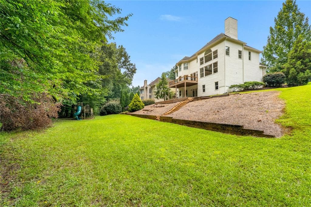 6 bedroom, 4 bathroom, 4,448 sq ft single family residence for sale at 10795 Cauley Creek Drive, Johns Creek, GA 30097 — photo 4