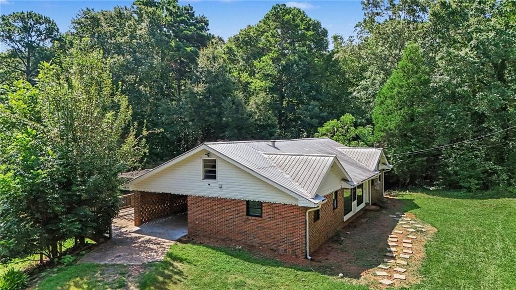 4 bedroom, 3 bathroom, 2,758 sq ft single family residence for sale at 476 Smoak Road, Griffin, GA 30223 — photo 3