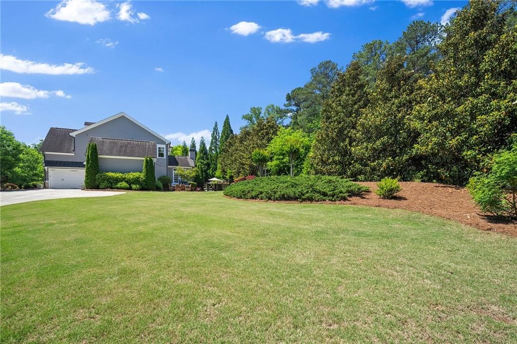 6 bedroom, 5 bathroom, 6,003 sq ft single family residence for sale at 410 Buckfield Lane, Milton, GA 30004 — photo 4