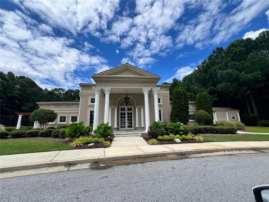 4 bedroom, 2 bathroom, 5,702 sq ft single family residence for sale at 5441 The Vyne Avenue, Atlanta, GA 30349 — photo 2