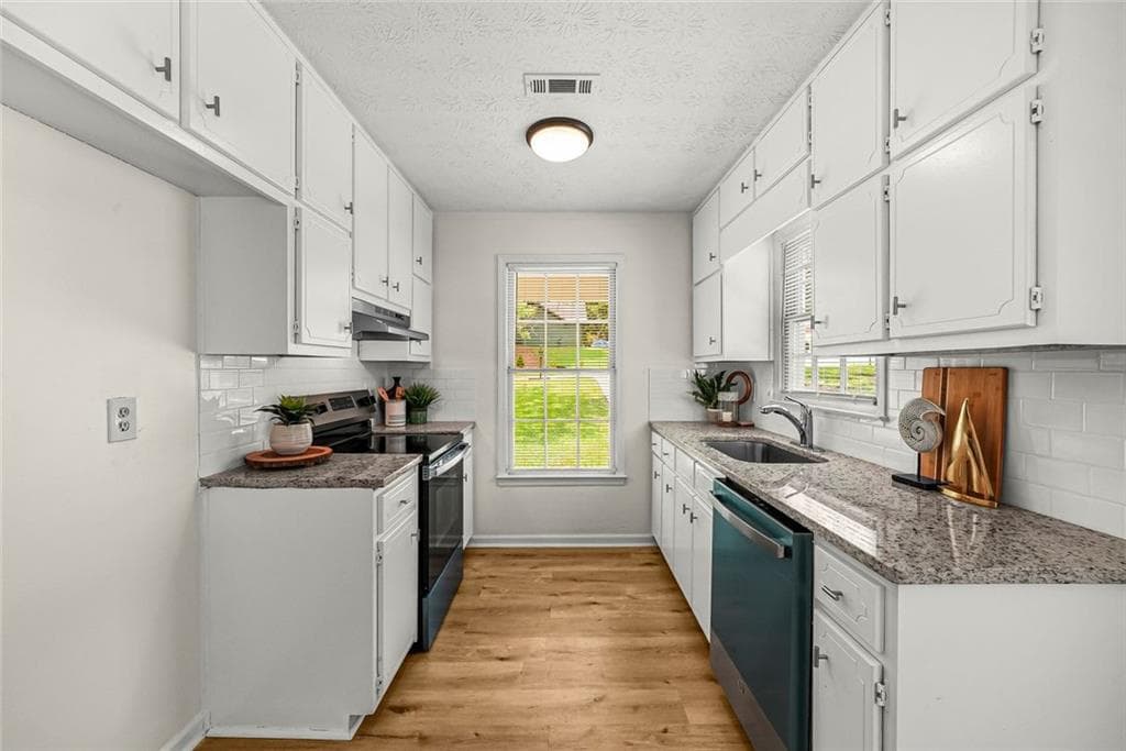 3 bedroom, 2 bathroom, 1,143 sq ft single family residence under contract at 8426 Alden Drive, Riverdale, GA 30274 — photo 6