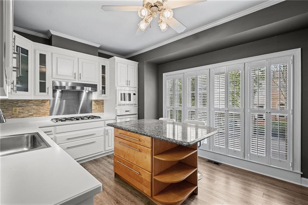 3 bedroom, 4 bathroom, 1,754 sq ft townhouse for sale at 9005 Niblick Drive, Alpharetta, GA 30022 — photo 8