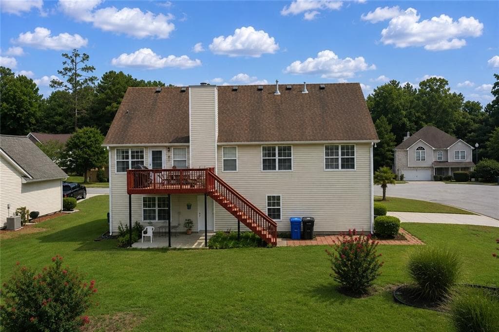 6 bedroom, 3 bathroom, 3,586 sq ft single family residence for sale at 1030 Chimney Trace Way, Lawrenceville, GA 30045 — photo 4