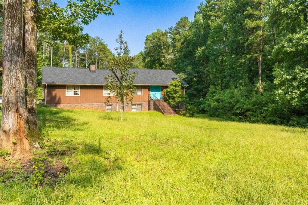4 bedroom, 2 bathroom, 1,774 sq ft single family residence for sale at 2911 Happy Hollow Drive, Conyers, GA 30094 — photo 3