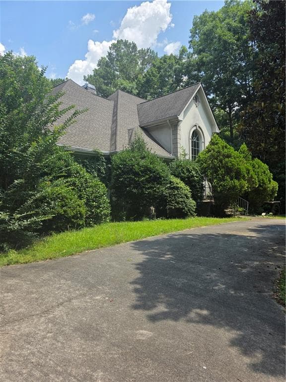 5 bedroom, 7 bathroom, 5,343 sq ft single family residence under contract at 5664 Silver Ridge Drive, Stone Mountain, GA 30087 — photo 2