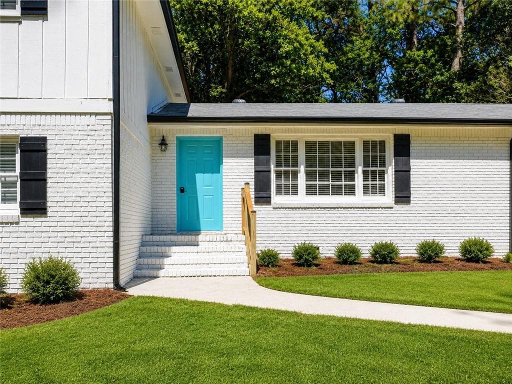 5 bedroom, 3 bathroom, 2,600 sq ft single family residence for sale at 298 W Wind Drive, Lilburn, GA 30047 — photo 2
