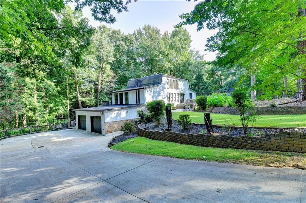 5 bedroom, 4 bathroom, 3,320 sq ft single family residence for sale at 117 Ridge Road, Berkeley Lake, GA 30096