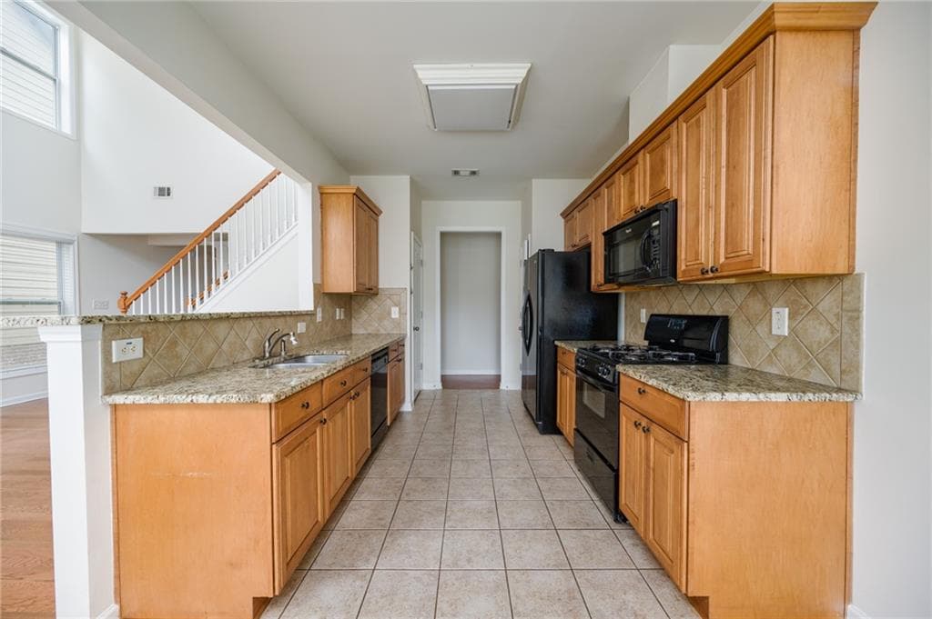 4 bedroom, 3 bathroom, 2,165 sq ft single family residence for sale at 2609 Brynfield Cove, Suwanee, GA 30024 — photo 10